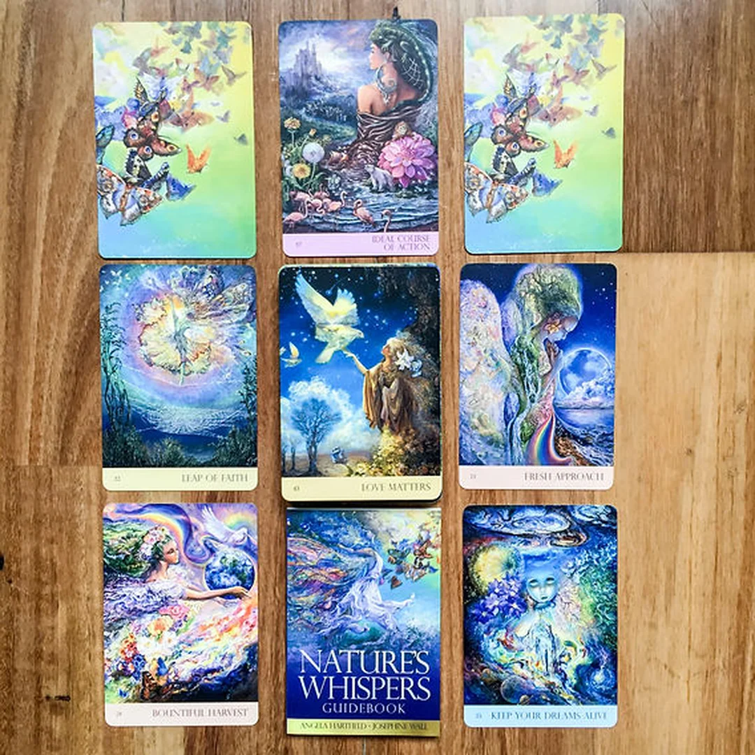Câu hỏi về Nature's Whispers Oracle Cards Bài nature's whispers oracle cards được xếp cạnh hộp để người mới quan sát